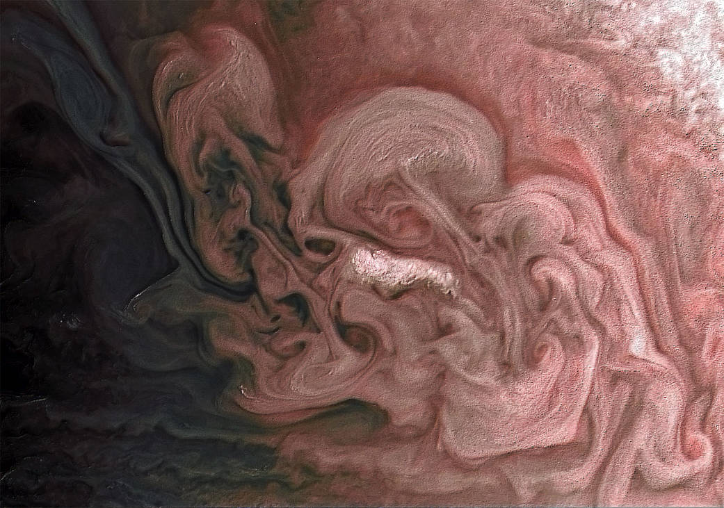 NASA Juno spacecraft beams back astonishing pic of rose-colored storms on Jupiter